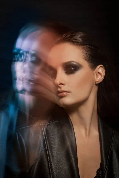 Closeup portrait of a serious lady with smoky eye makeup — Stock Photo, Image