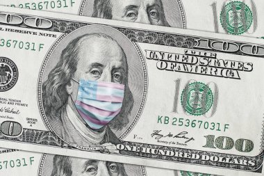 ABD 'de COVID-19 Coronavirüs. Yüz maskeli yüz altın para..