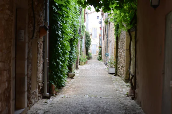 Old dark alleyway in a french village