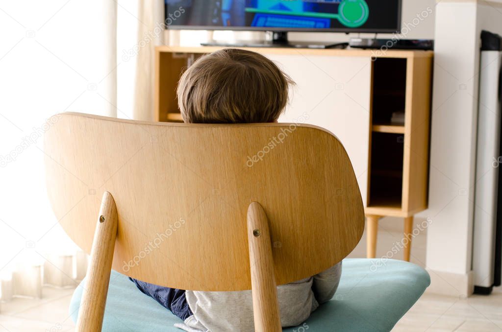 little boy watching tv