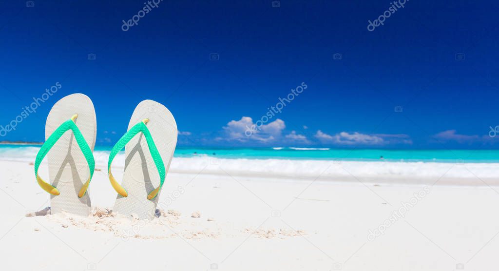 Colorful flip flops on the tropical beach in Cayo Largo, Cuba