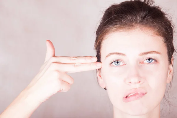 Portrait of stressed young woman in modern kitchen — Stock Photo, Image