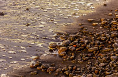 Volkanik kum ve mineraller stromboli Isla taşlarla Beach