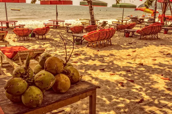 cocos sun sand and turquoise sea on the ochheuteal tourist beach near the city of Sihanoukville. Cambodia