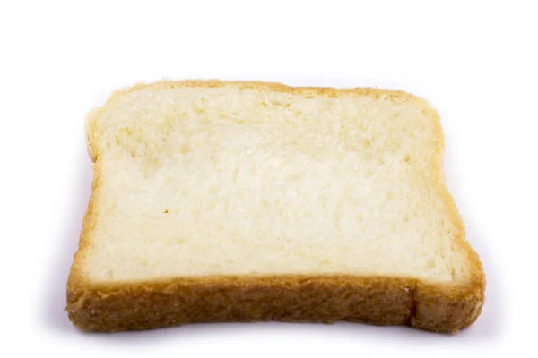 Kousek chleba izolovat krajíc bílého chleba izolované na pozadí — Stock fotografie