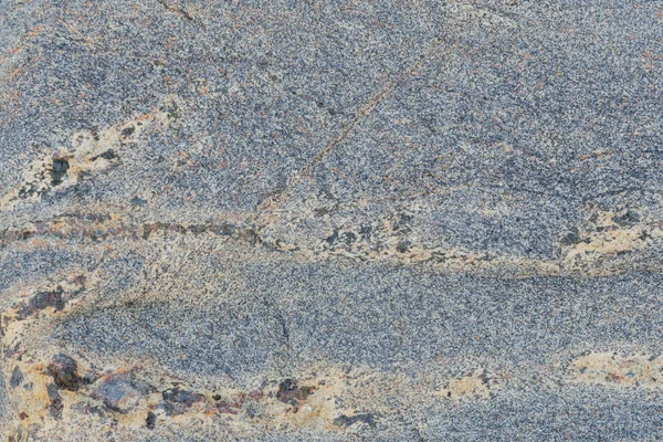 The texture of the stone with various impregnations. — Stock Photo, Image