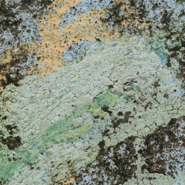 taştan bir duvar üzerinde kırık boya.