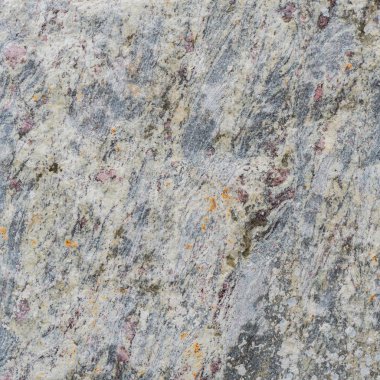 Gri Doku pembe benekli bir taş.