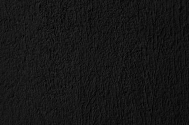 Soyut siyah arkaplan. Siyah sıva dokusu. Koyu sert yüzey.