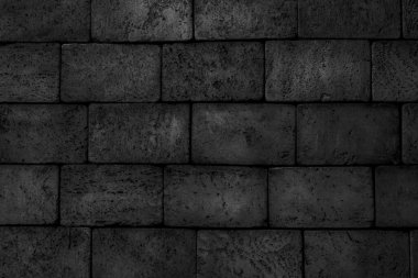 Soyut siyah arkaplan. Siyah tuğla dokusu. Koyu sert duvar yüzeyi.