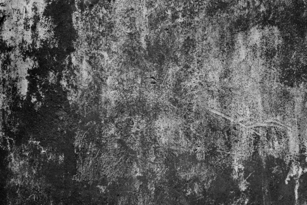 Abstract black background. Black stucco texture. Dark rough surface.