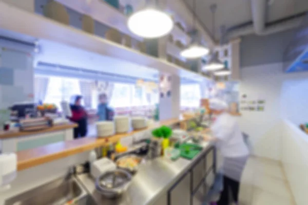 Cuisine of restaurant. Chrome kitchen equipment cafe. Production room. Soft focus.