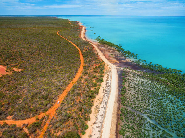 Aerial view of earth textures, road and ocean, Western Australia, Francois Peron