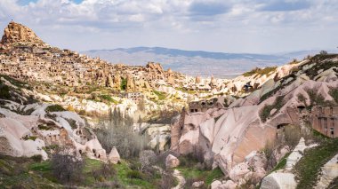 Uchisar town and castle from Pigeon Valley, Cappadocia, Turkey clipart