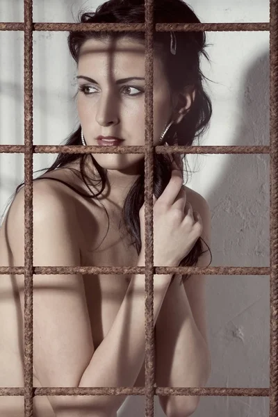 Woman in a cage
