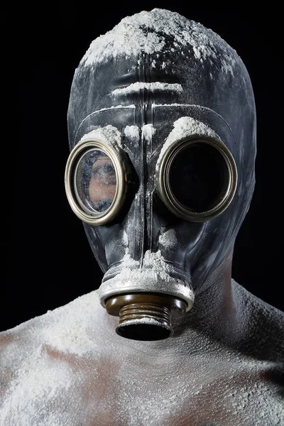 Man wearing a gasmask on his face