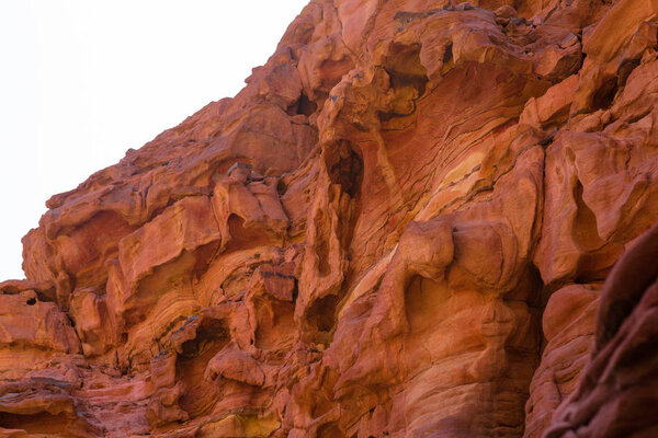 Coloured Canyon is a rock formation on South Sinai (Egypt) peninsula. Desert rocks of multicolored sandstone background.