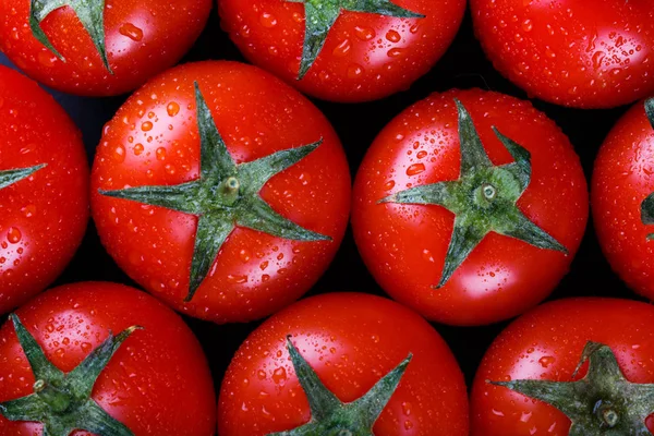 taze domates arka plan, su damlaları. Makro