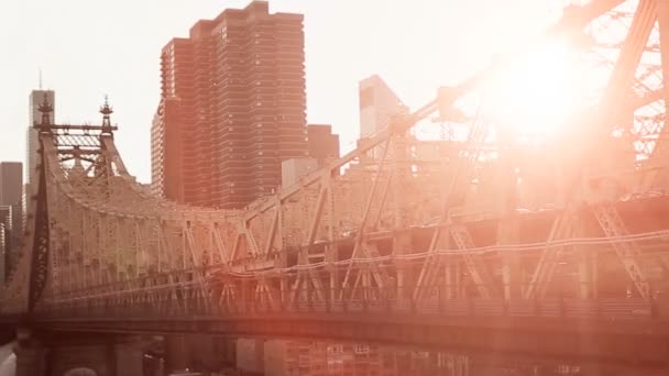 Beautiful sunset background bridge lens flare red sky aerial view flying — Stock Video