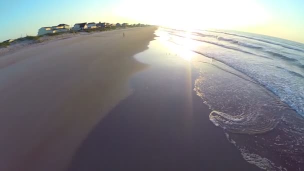 Aerial of bright sunrise on beach — Stock Video