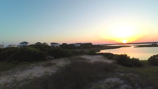 Aerial view of ocean and sound at sunset — Stock Video