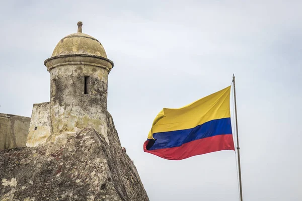 Colombian flag and tower of a fortress