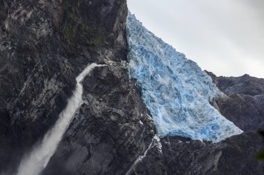 Ventisquero glacier and a waterfall clipart