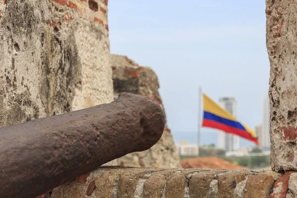 Rusty cannon and colombian flag