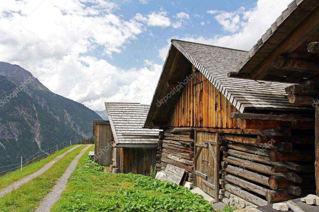 Old farmhouses in the mountains of Austria. Historic old houses and places