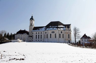 The famous Wieskirche at Steingaden in winter clipart