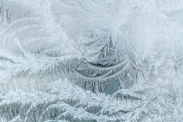Frosty patterns on the window . — стоковое фото