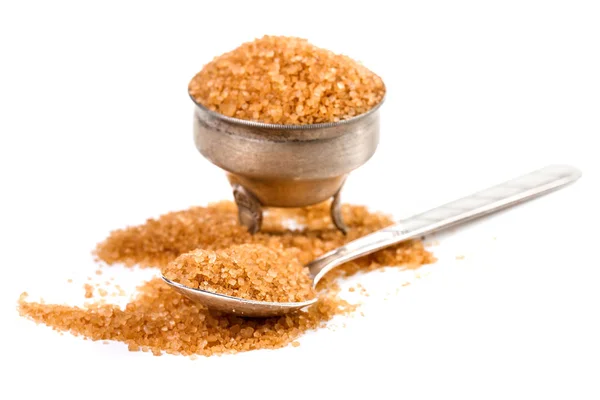 Close up of brown sugar on white background — Stock Photo, Image