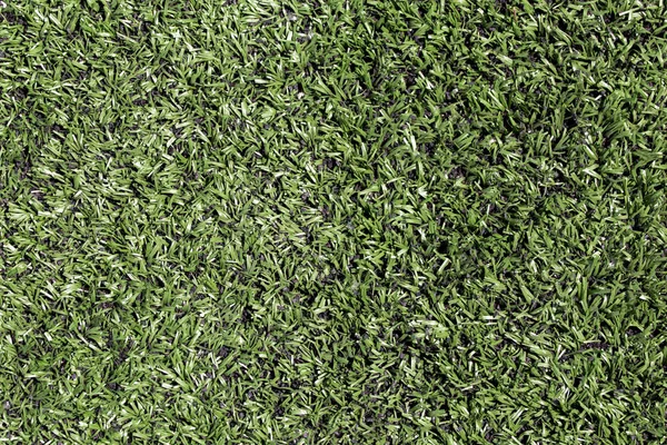 Искусственное зеленое газонное поле. Вид сверху. Текстура. Фон — стоковое фото