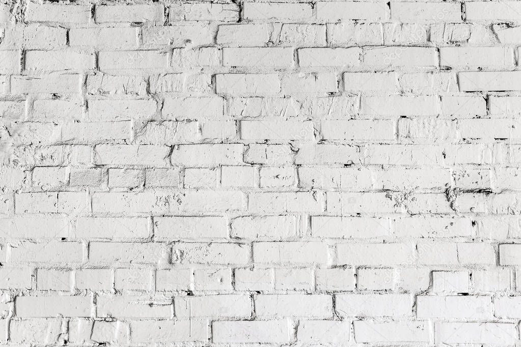 White brick wall texture. Aged  wheathered background. Abstract white textured pattern