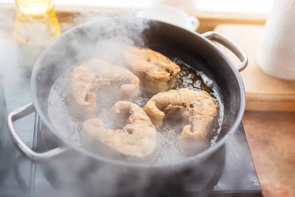 Pan with frying sturgeon fish. Outdoor kitchen. Summer barbeque and vacation — Stock Photo, Image