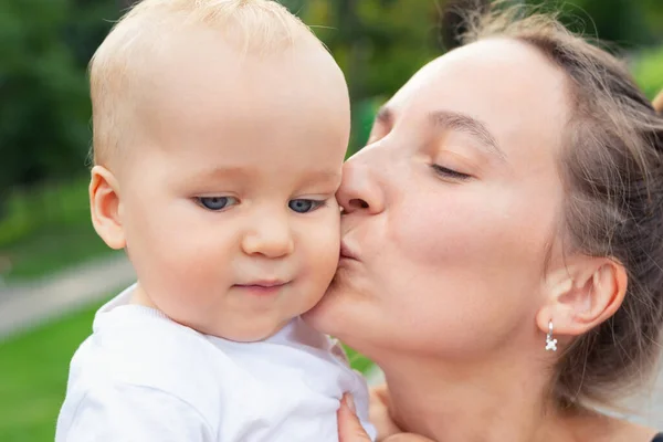 Young Adult Attractive Beautiful Caucasian Mom Kissing Little Blond Toddler — Stock Photo, Image