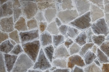 Modern tarz dekoratif desenli gri desen çatlamış gerçek taş duvar yüzeyi çimentoyla