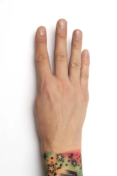 Ręka na białym tle pokazuje numer cztery. Skierowaną w górę 4 palce dłoni. 4. — Zdjęcie stockowe