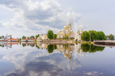 Temples of the Nilo-Stolobenskaya desert with reflection in the  clipart