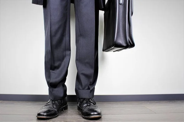 An image of a business man with a suitcase — Stock Photo, Image