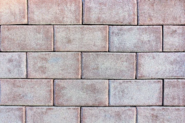 Una imagen de un muro de piedra en el jardín — Foto de Stock