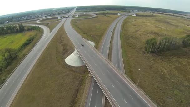 Aerial shot of highway junction with cars — Stock Video