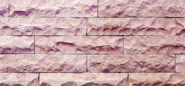 Kırmızı renk ve dokudan oluşan harici çalışmalar için taş sırada.