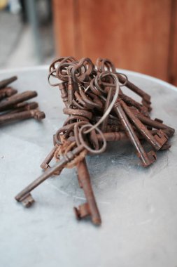 Old rusty keys on a table