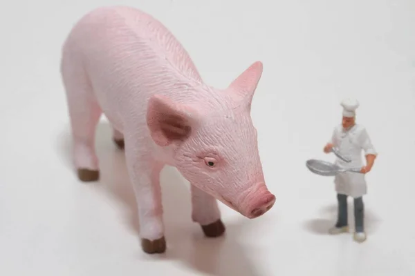 Miniature Cooks Giant Pork — Stock Photo, Image