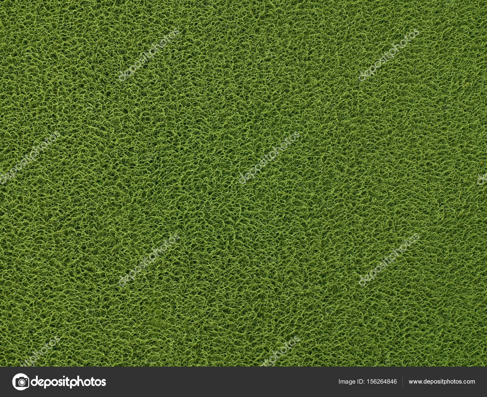 Texture Background Of The Green Plastic Doormat Stock