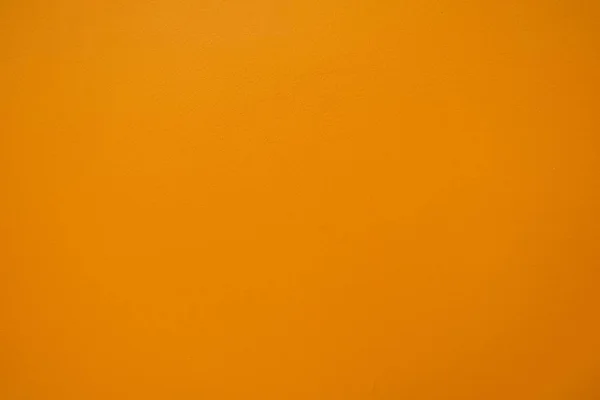 Horizontale textuur van Oranje gepleisterde muur achtergrond — Stockfoto