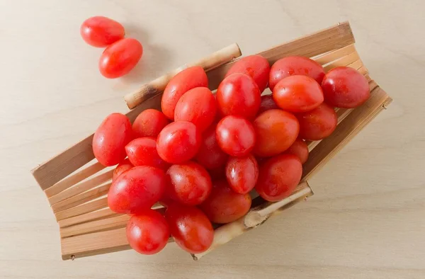 Delicious Fresh Red Tomatoes on Small Boat