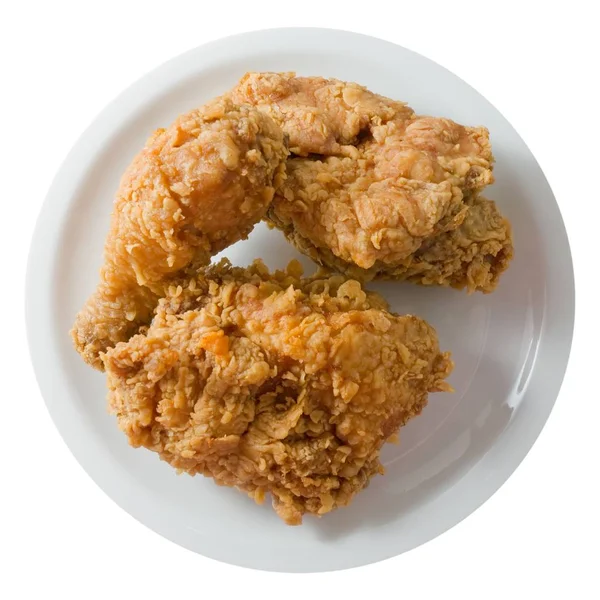 Жареный цыпленок на белой тарелке — стоковое фото
