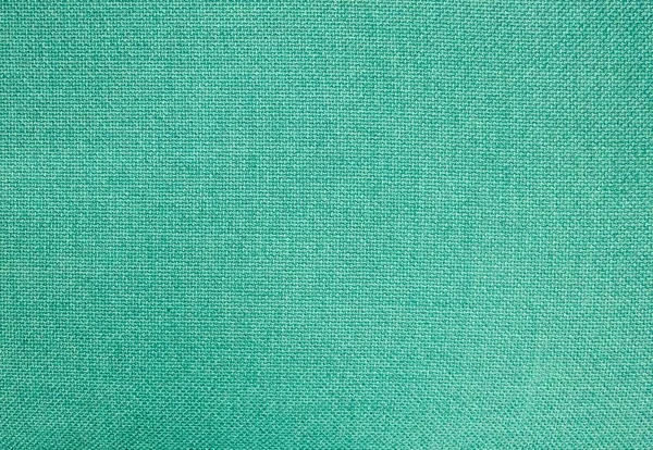 Fundo pastel de textura têxtil de algodão verde — Fotografia de Stock